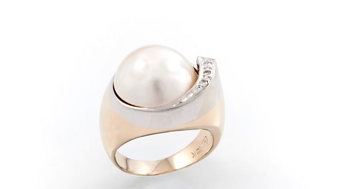 Bague - Or 10K jaune noeuds twist & pavé de cz - RIG804