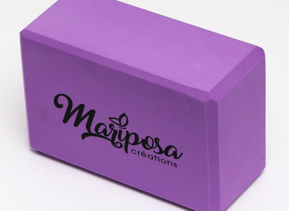 Yoga block made of ultra light purple foam (4x6x9”)