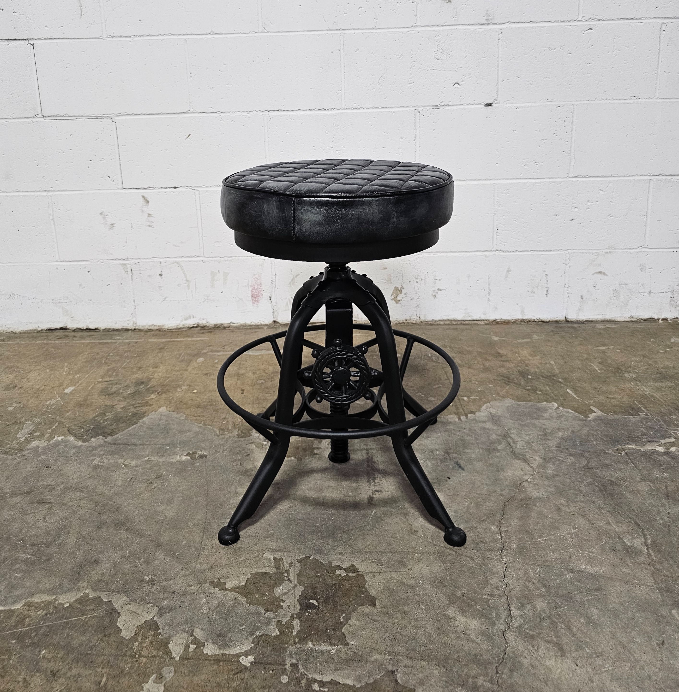 Industrial style adjustable stool in black leather