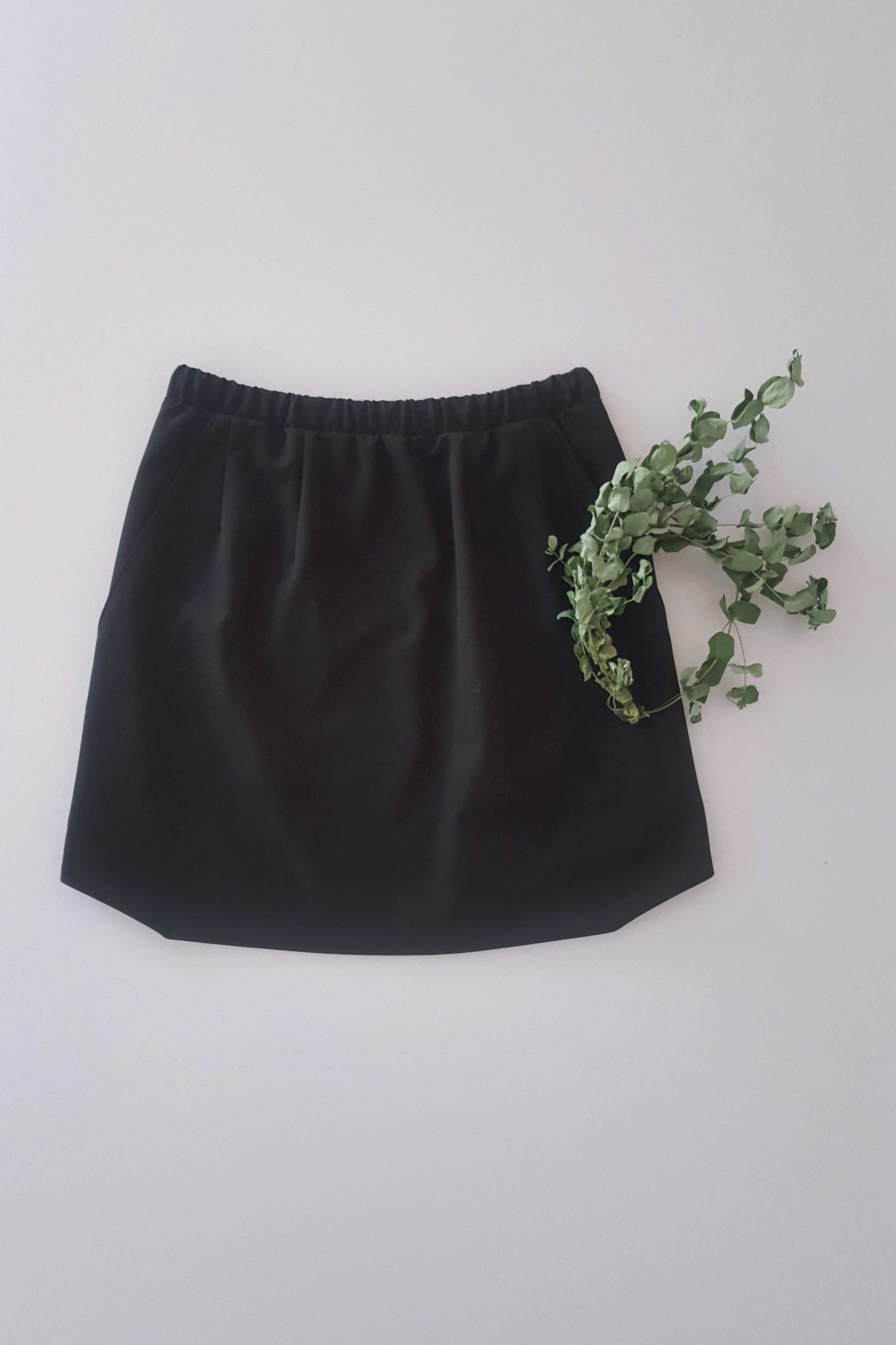 Black elastic hotsell mini skirt